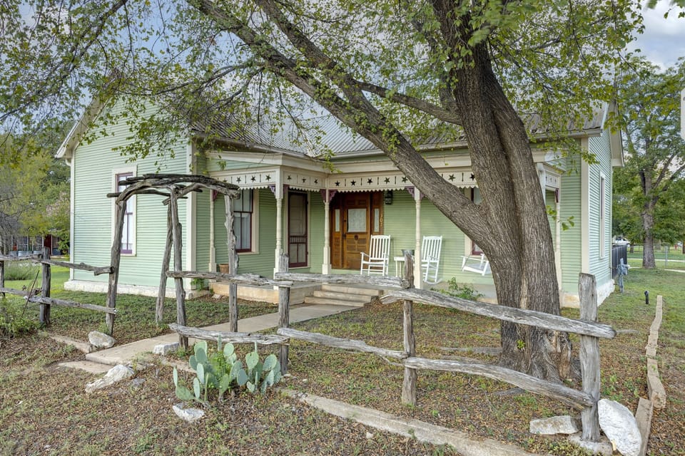Step into classic Fredericksburg charm with this historic home nestled on quiet Creek Street, just minutes from Main Street shops and wineries.