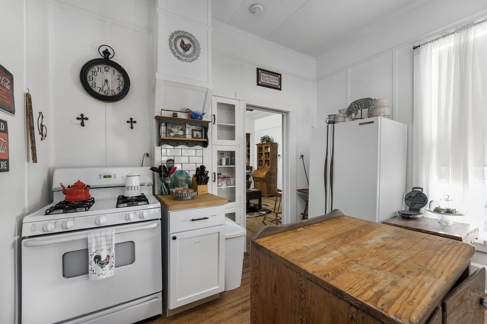 Cook with ease in this charming kitchen, fully stocked with everything you need for home cooked meals during your stay in Fredericksburg.