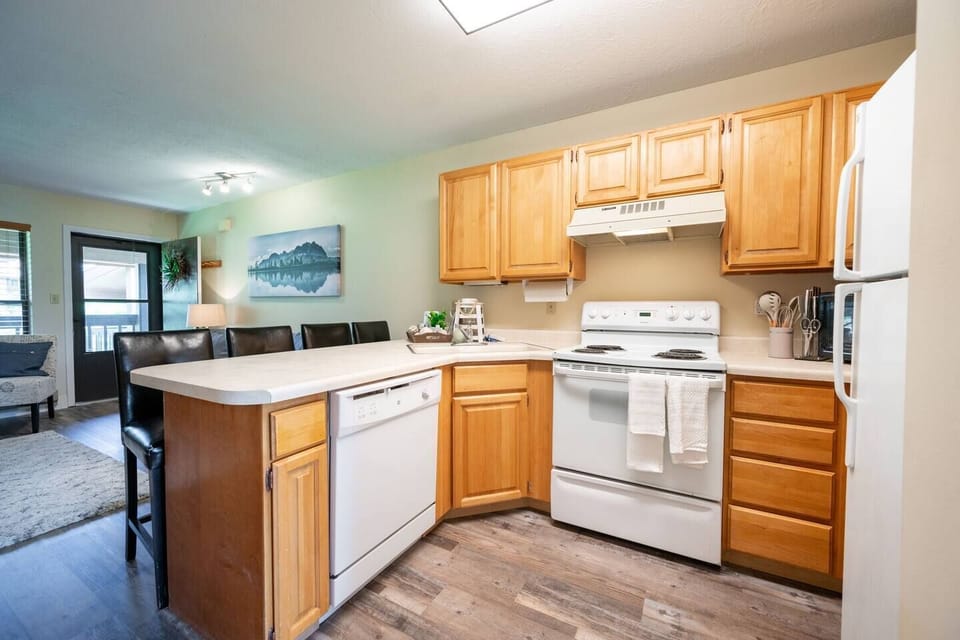 Cook your favorite meals in a kitchen bathed in natural light that enhance the culinary experience.