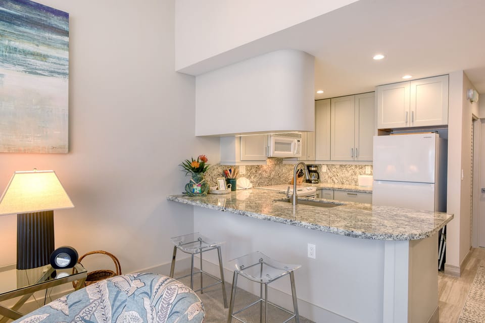 Curves are repeated in cabinets, counter, flooring