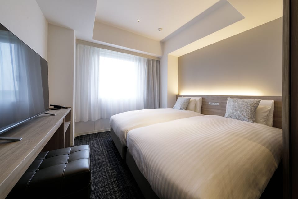 Standard Twin Room | In-room safe, laptop workspace, blackout drapes, free WiFi