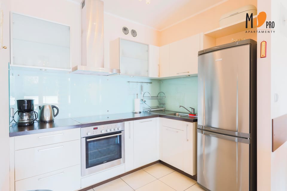 Comfort Apartment, Balcony, Park View | Private kitchenette | Fridge, microwave, dishwasher, coffee/tea maker