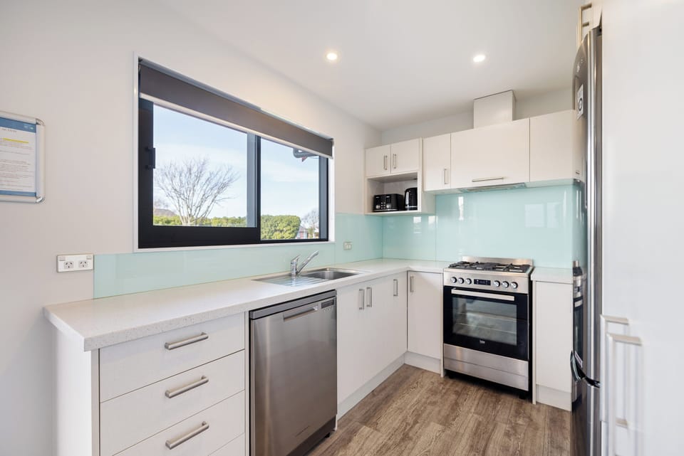 Deluxe 2 Bedroom Villa | Private kitchen | Shared fridge, shared microwave, dining table