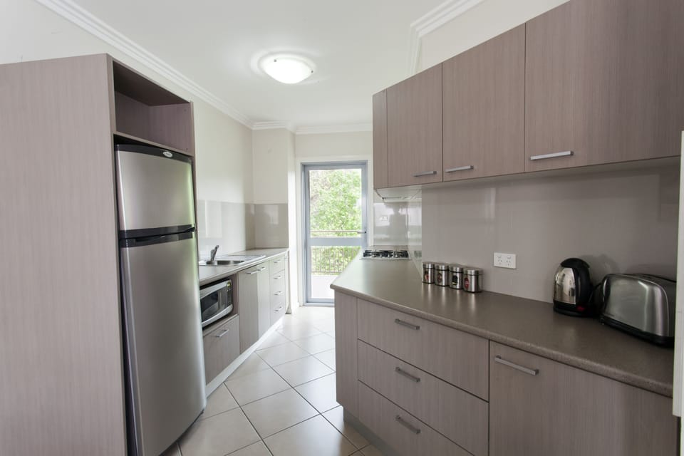 Apartment, 2 Bedrooms | Private kitchen | Coffee/tea maker, fridge, microwave, oven
