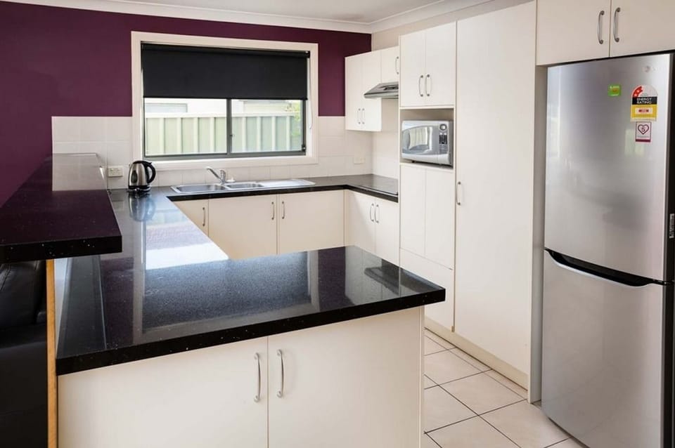 Apartment, 3 Bedrooms | Private kitchen | Coffee/tea maker, fridge, microwave, oven