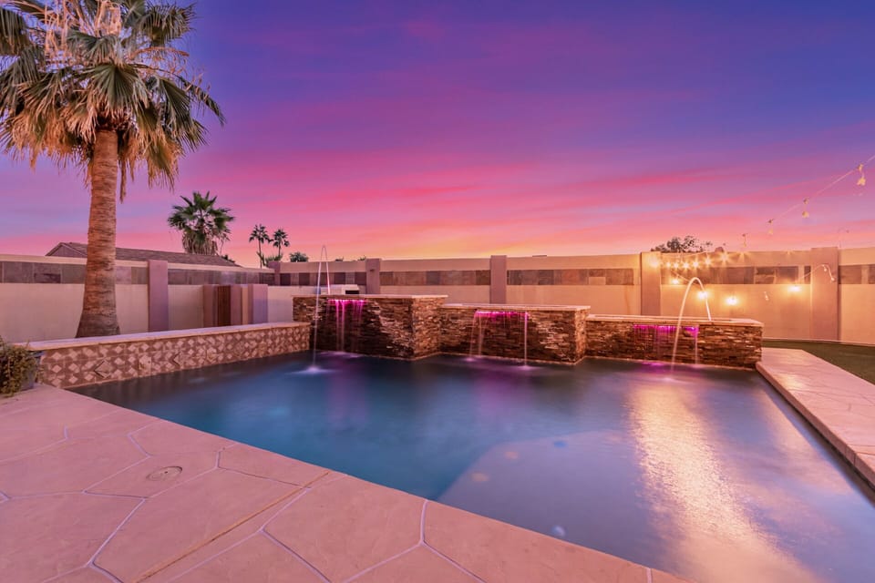 Heated pool with 5 waterfalls. 