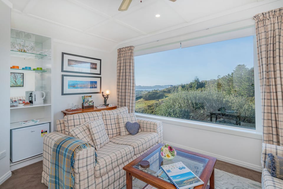 Tui Suite | Living area | 55-inch flat-screen TV with satellite channels, TV, Netflix