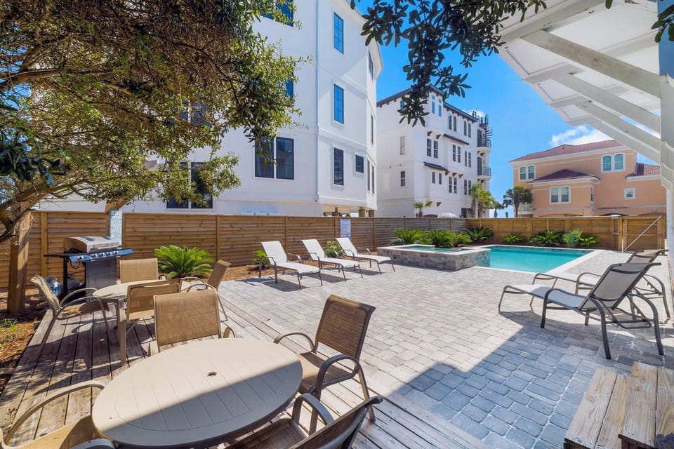 The Spacious Backyard Connects To The Beach