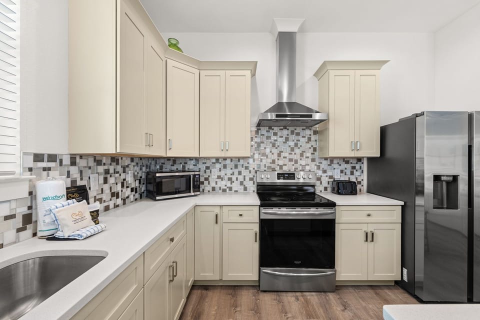 Living and Kitchen Area That Open Up To The Backyard