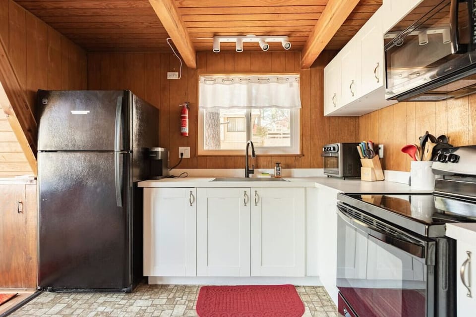 I’ve got coffee maker and some coffee supplies, cooking pots and pans, spice rack, air fryer/toaster, magic bullet blender, waffle maker, wine opener, can opener, etc. There are a ton of cleaning supplies under the sink and feel free to use them.