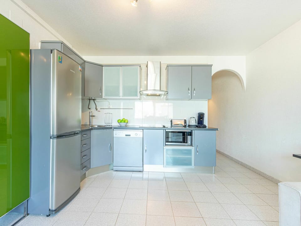 Cabinetry, Countertop, Property, Building, Window, Kitchen Stove, Kitchen Appliance, House, Interior Design, Kitchen