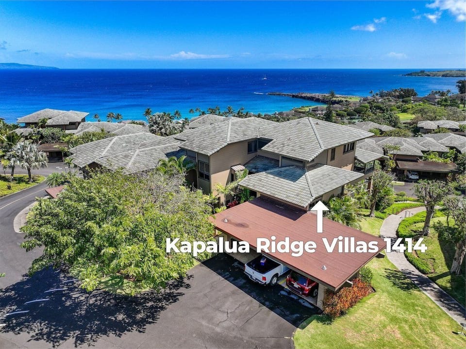 Elevated aerial view showcasing Kapalua Ridge Villas near beaches and golf.