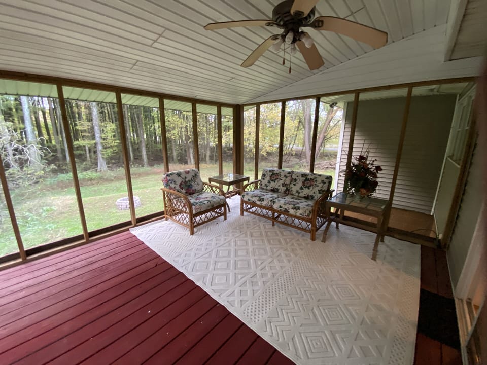 Screened in porch off the Master bedroom