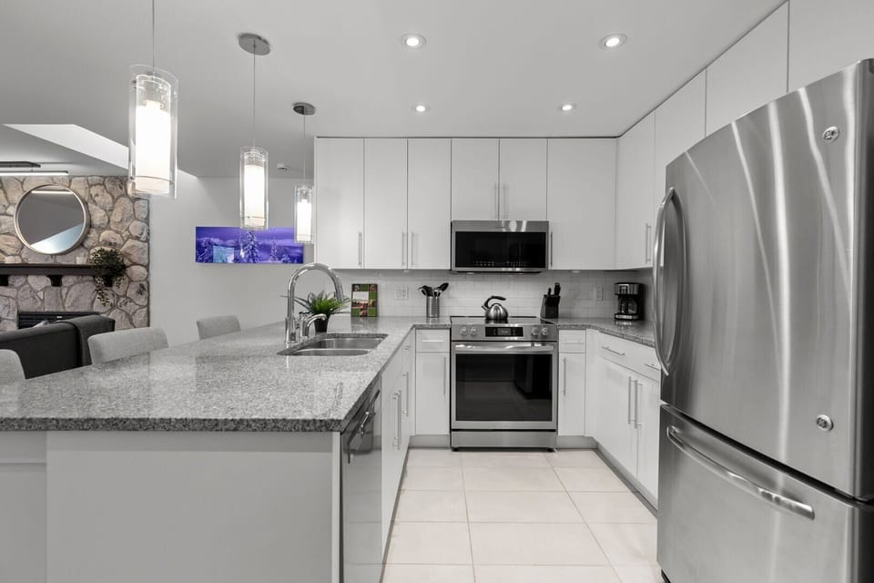 A fully equipped kitchen with stainless steel appliances for your culinary adventures.