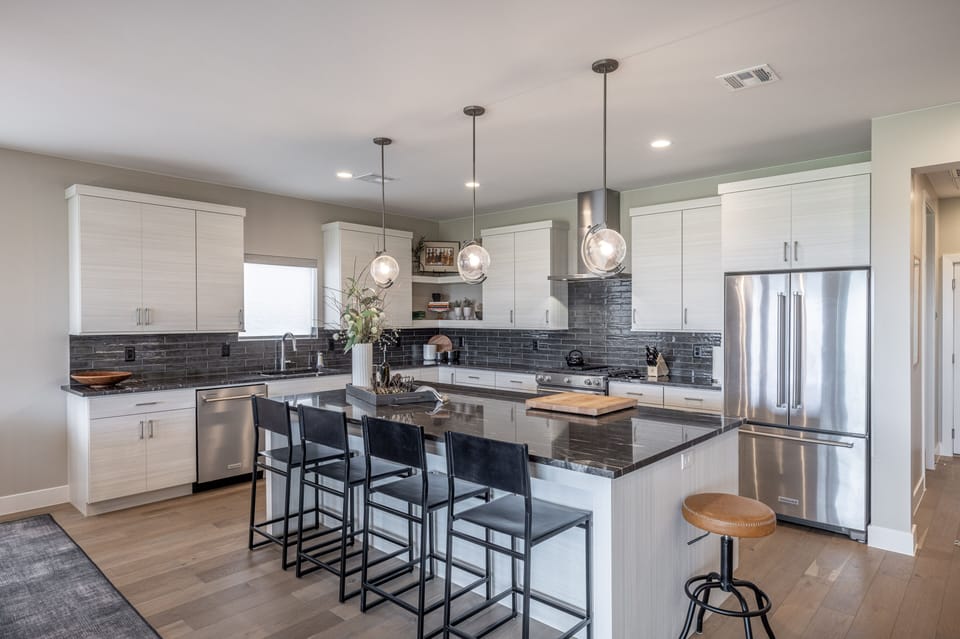 Kitchen Island - The Kitchen Island comfortably seats 4 adults and creates a great space for serving and preparing meals.
