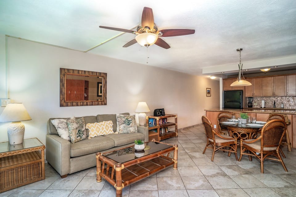 Living area complete with flat screen TV~ ceiling fan and AC