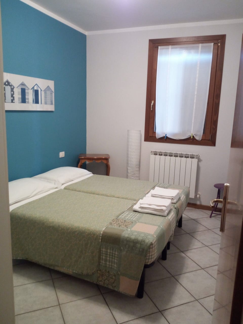 small room with two beds