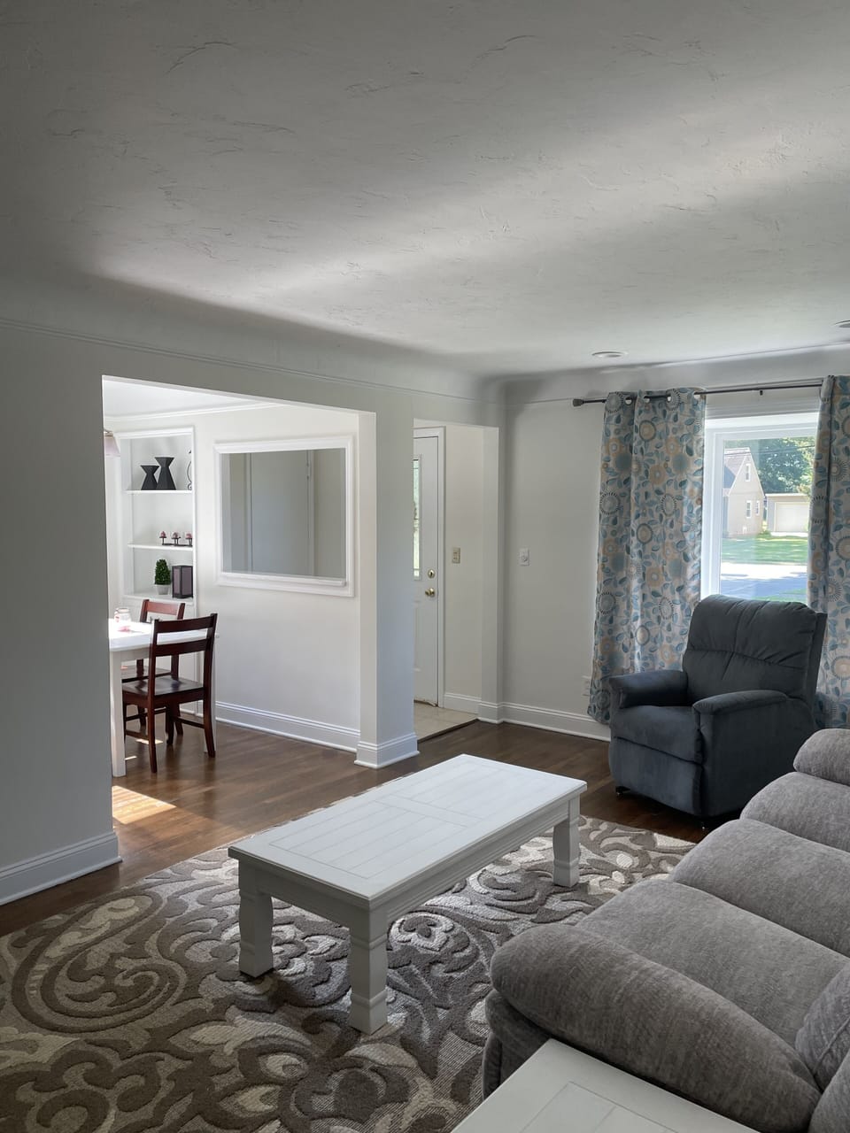 Living room - The living room flows naturally into the dining area and kitchen