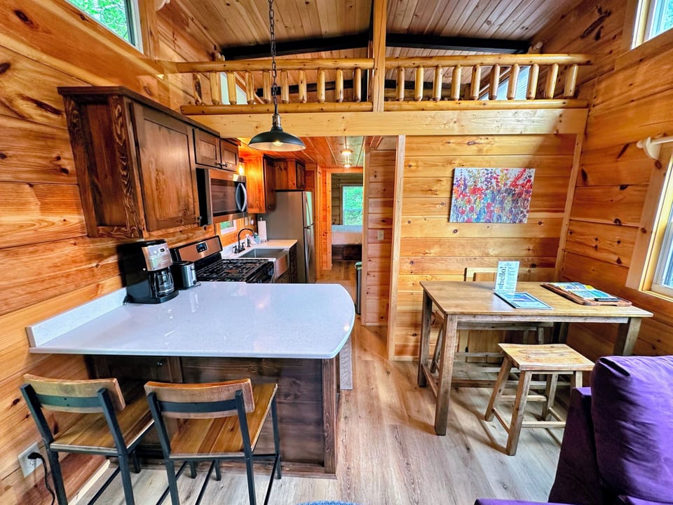 The living room conveniently extends to the dining and kitchen  area. A few feet away brings you to the master's bedroom.