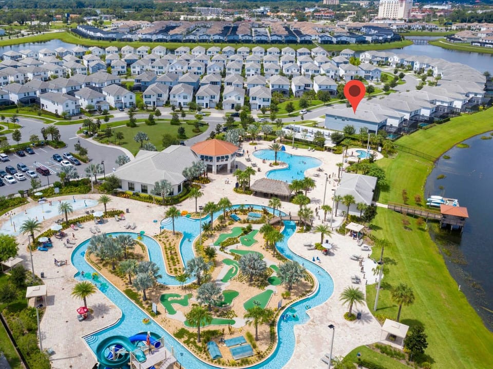 Resort Amenities - Indulge in ultimate relaxation as you float in the sun-kissed waters of the resort lazy river, offering a serene retreat just steps from your door.