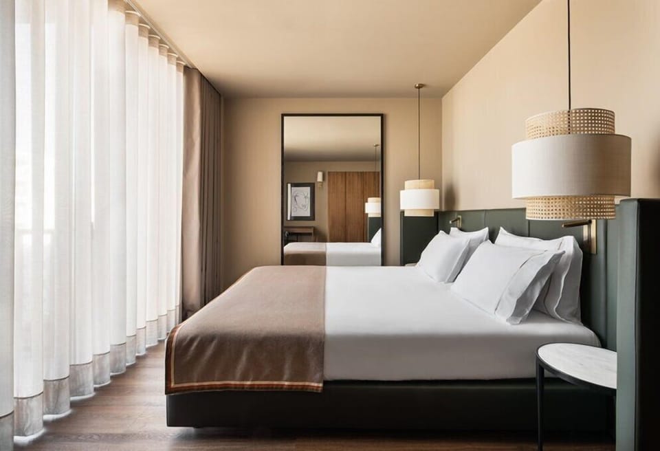 Double Room | Minibar, in-room safe, laptop workspace, soundproofing
