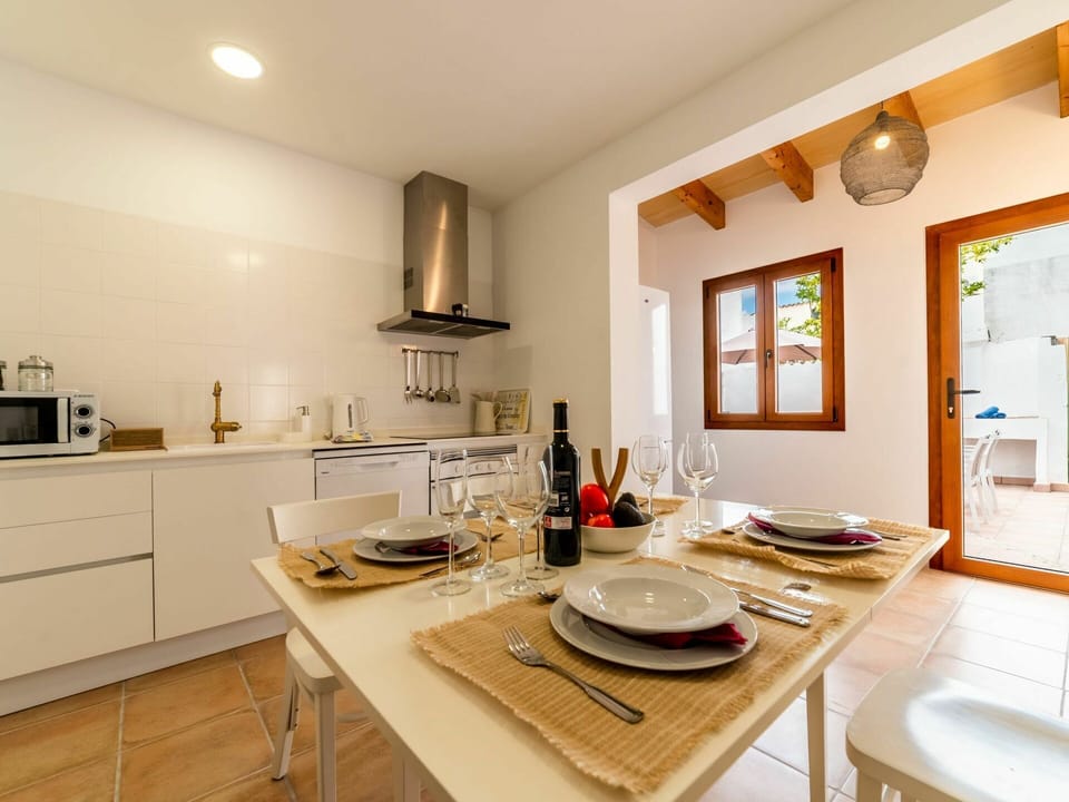 Table, Property, Furniture, Cabinetry, Wood, Tableware, Chair, Lighting, Countertop, Kitchen