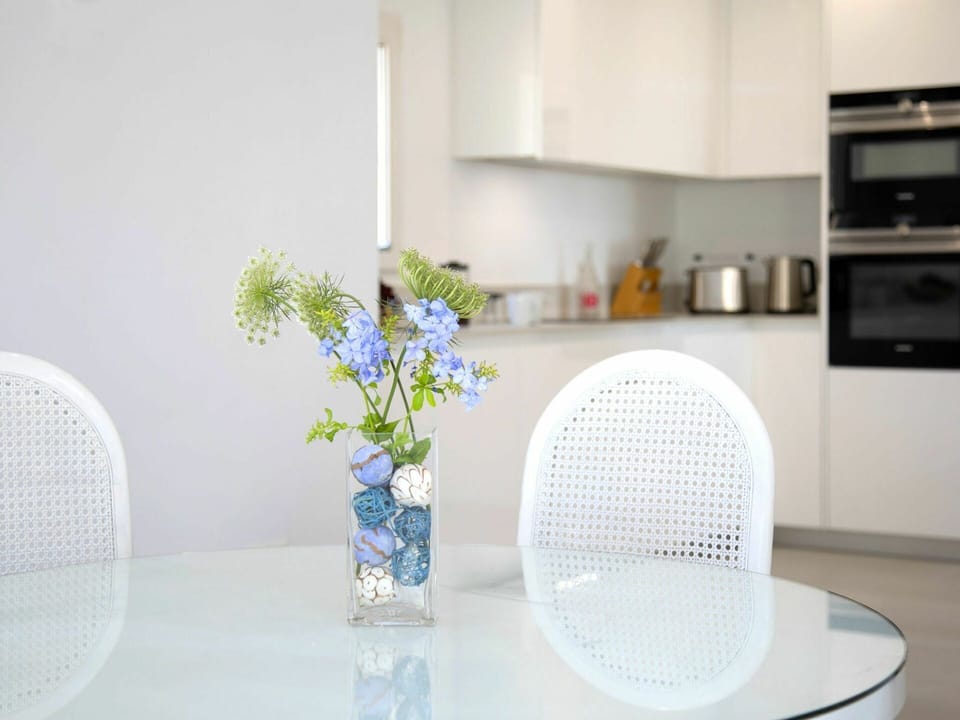 Furniture, Property, Plant, Cabinetry, Flower, Chair, Interior Design, Rectangle, Vase, Kitchen Appliance