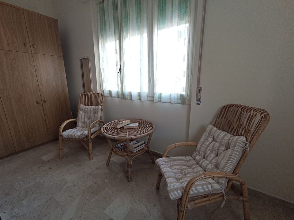Furniture, Chair, Curtain, Window, Wood, Table, Comfort, Outdoor Furniture, Floor, Shade