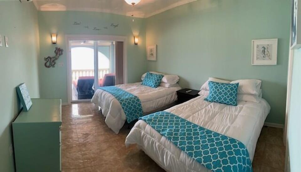 two double beds in the 2nd bedroom