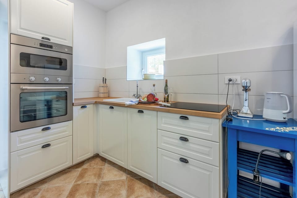 Espresso maker, fridge, microwave, oven