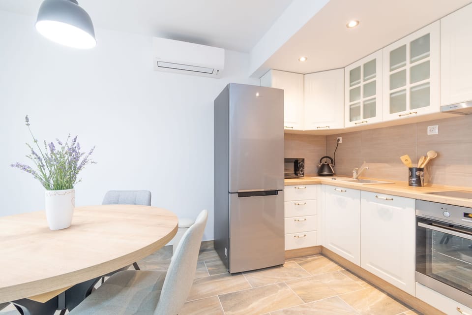 Villa | Private kitchen | Fridge, microwave, oven, stovetop