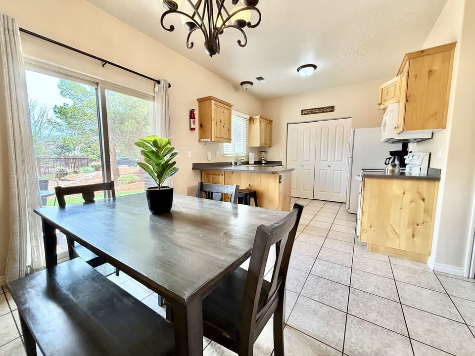 The fully stocked kitchen, with patio access facing  the pool!