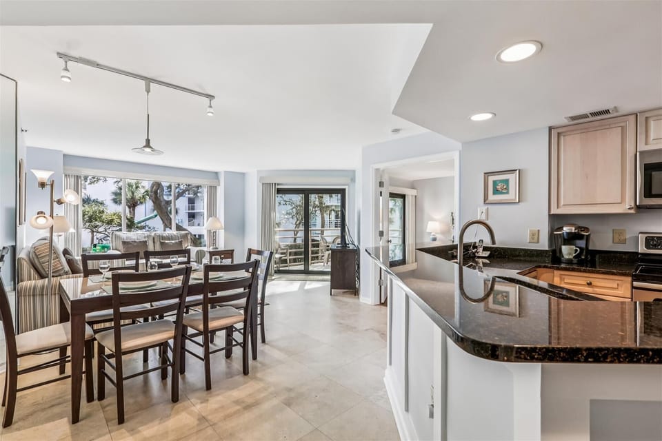 Dining Area, Kitchen and Living Room at 2112 Villamare