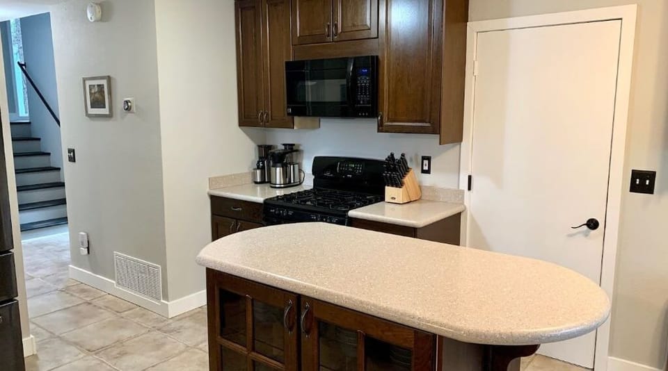 Kitchen is full appointed with all cooking, glass, and dishware you could need.