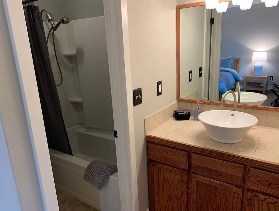 Master bathroom with separate tub/shower and toilet.