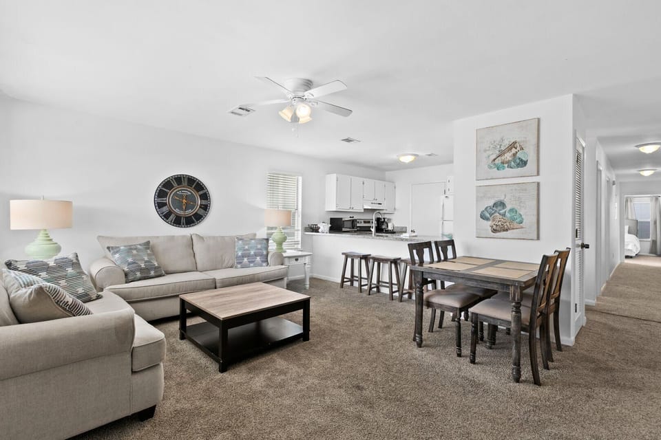 Living room with site lines to kitchen.