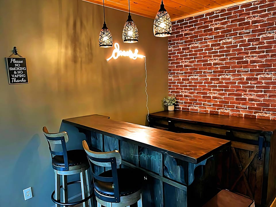 Sit back at the bar while taking a break from your pool game