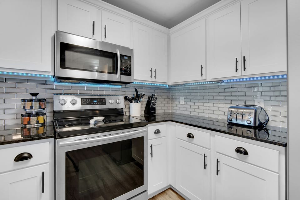 Kitchen - This gourmet kitchen is a chef’s dream, boasting modern appliances and all the essentials to craft delicious, memorable meals.