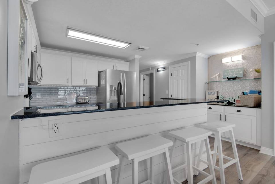 Kitchen - This gourmet kitchen is a chef’s dream, boasting modern appliances and all the essentials to craft delicious, memorable meals.