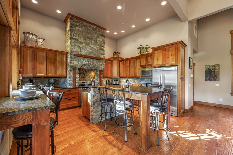 A chef's kitchen equipped with high-end appliances and ample counter space