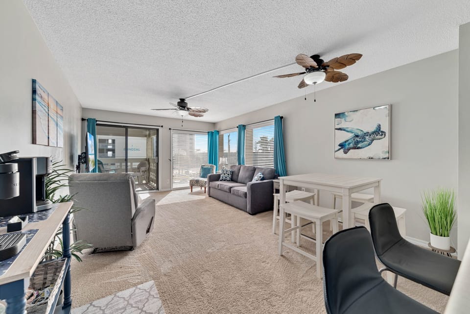Living room with large windows to provide ample natural light