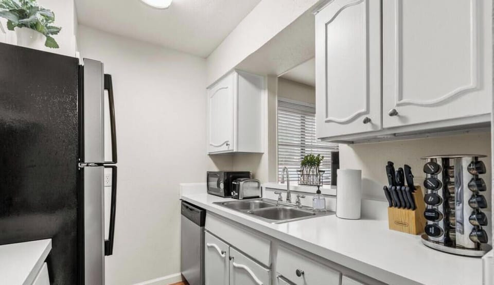 Fully stocked kitchen with pantry and dishwasher
