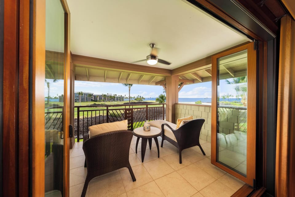 Doors open full length of the room to bring tropical breezes into your sanctuary.
