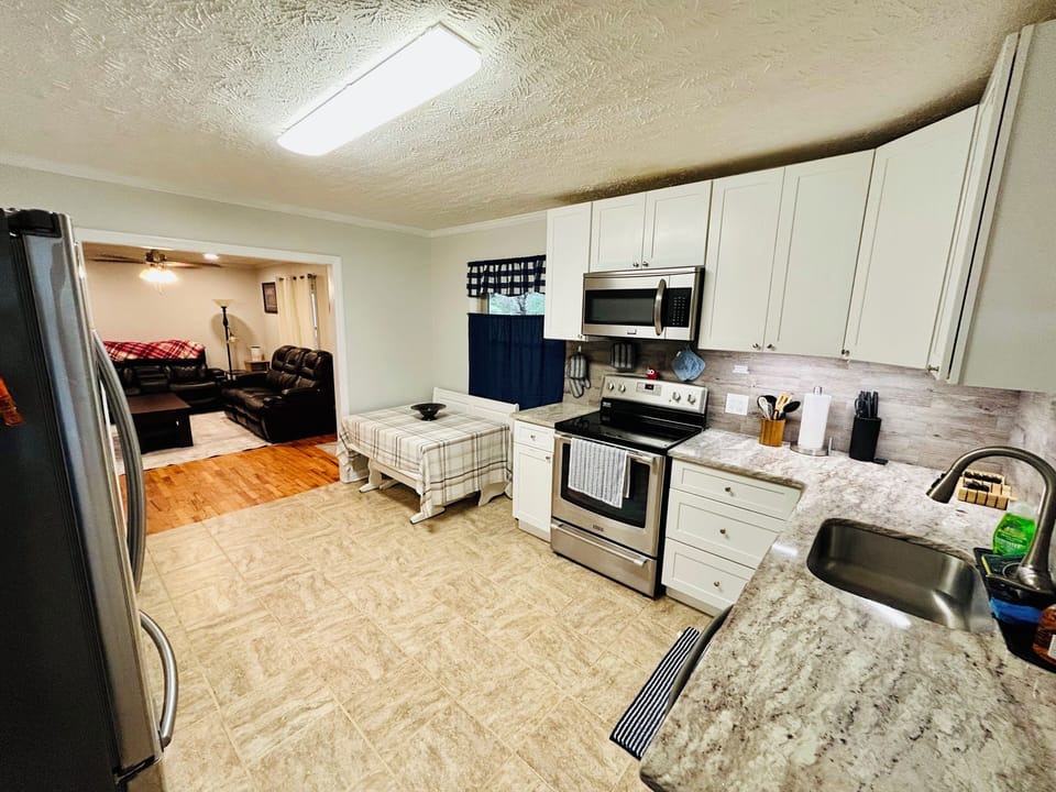 Full Kitchen - Electric range & dishwasher, microwave