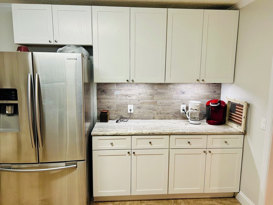 Full Kitchen - Full size fridge with ice maker - Kuerig & 12 cup coffee maker  