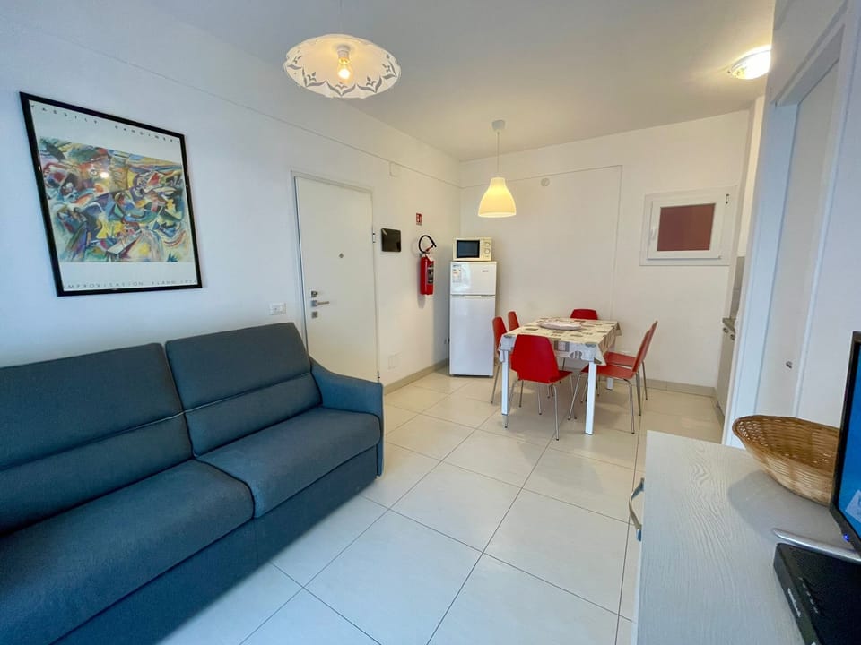 Apartment, 2 Bedrooms, Balcony | Living room | TV