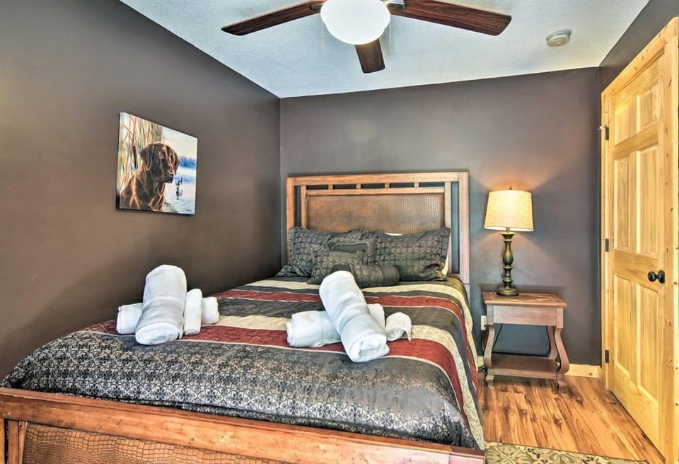 This bedroom features a cozy queen-sized bed.