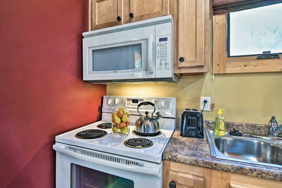 The kitchen is fully equipped with up-to-date appliances.