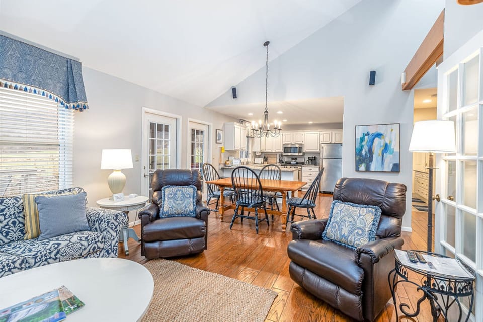 Looking into kitchen and dining area from casual living room