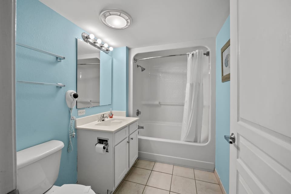 Wash the day away in this spacious bathroom.